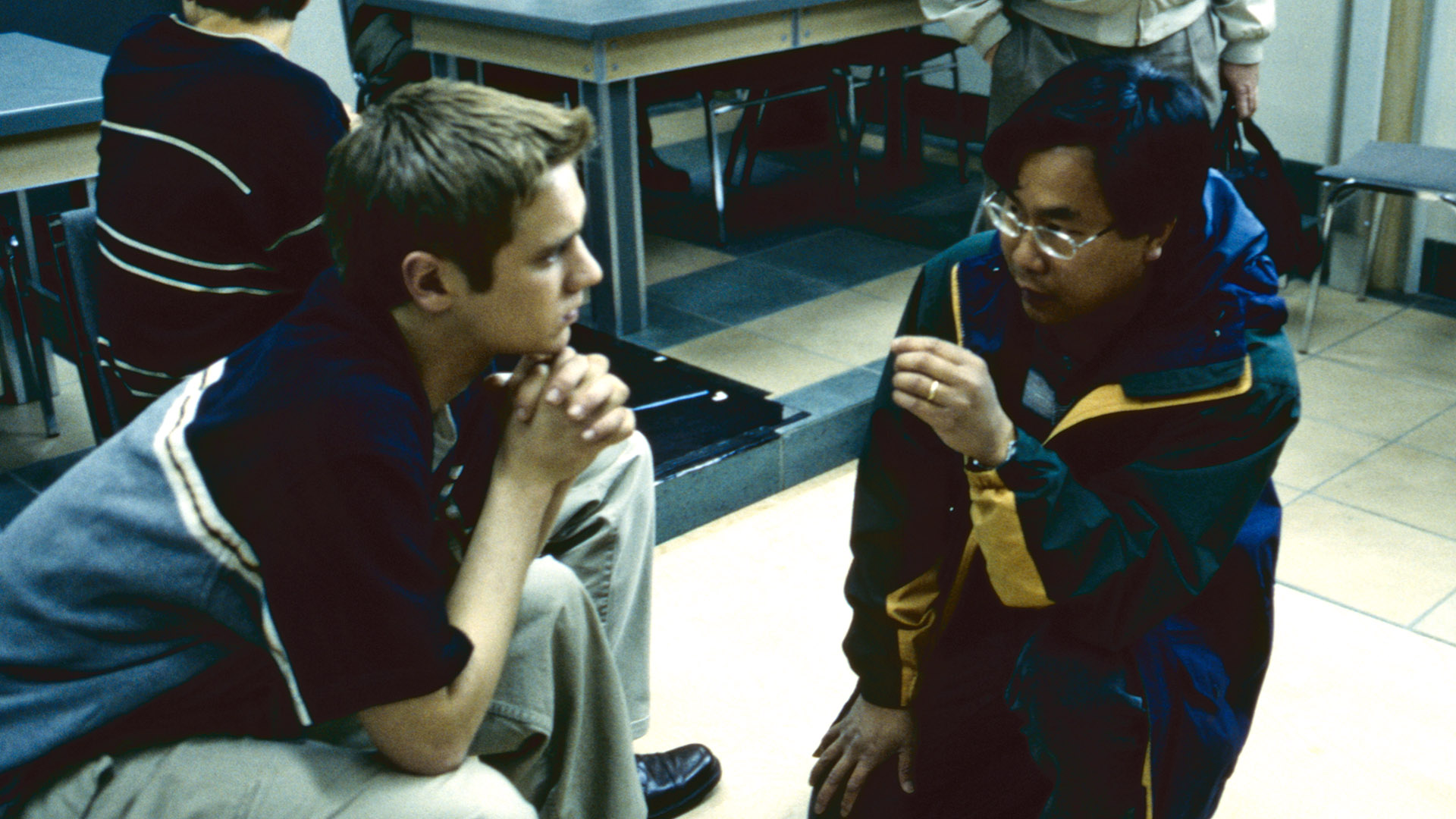 James Wong discussing a scene with Tony Todd on set
