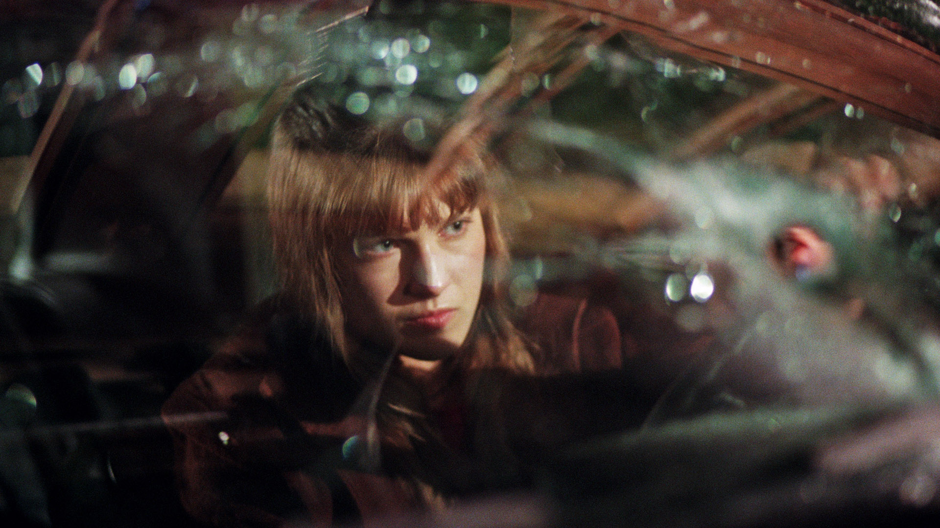 Clear trapped in the damaged car