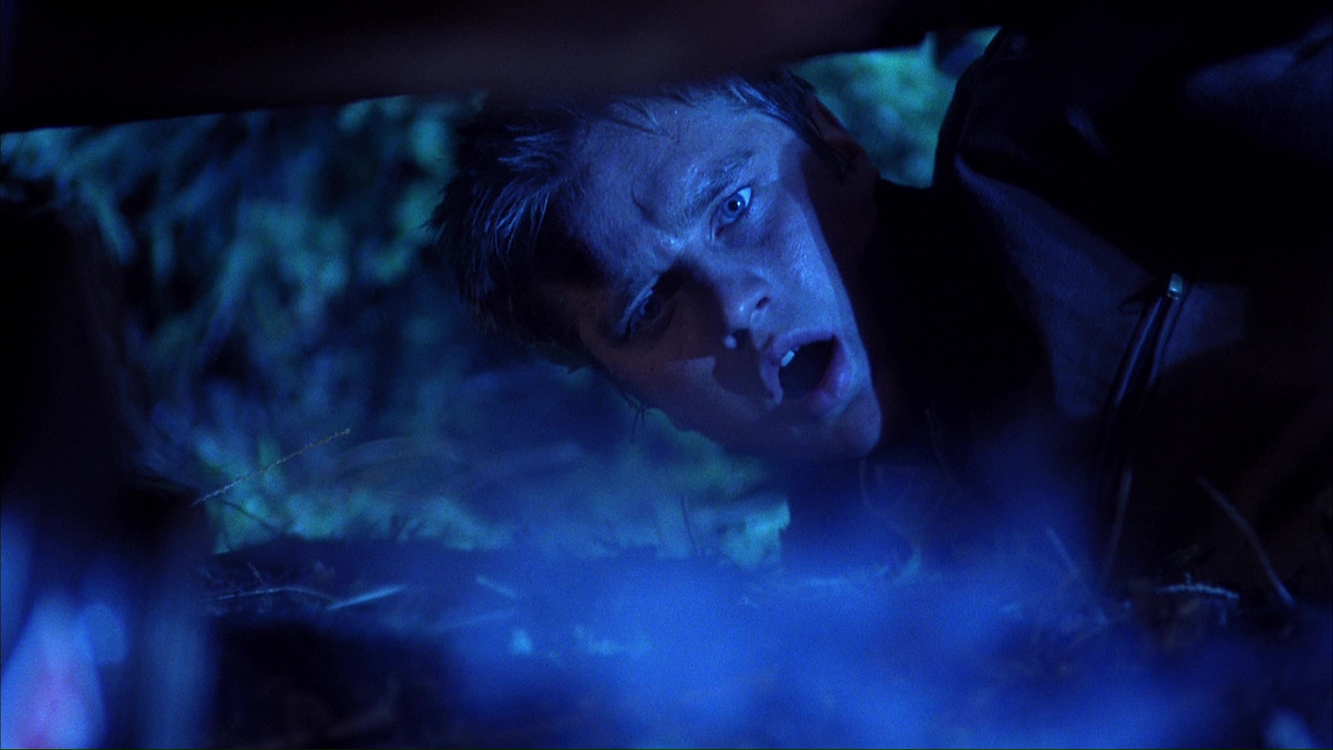 Clear's escape from the garage. Film frame 01415.