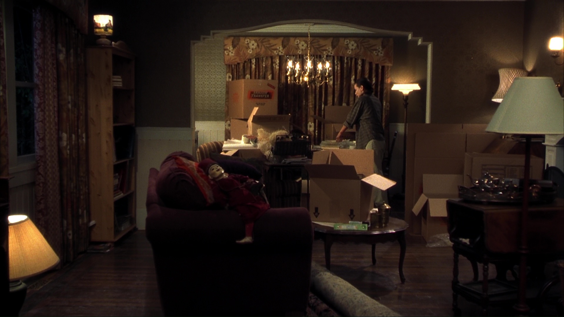 The fire at Ms. Lewton's house and the investigation. Film frame 00888.