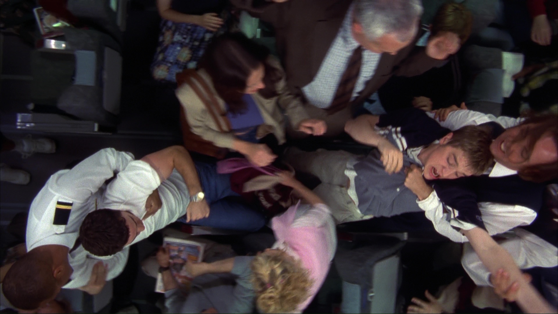 The survivors at the departure gate. Film frame 00379.