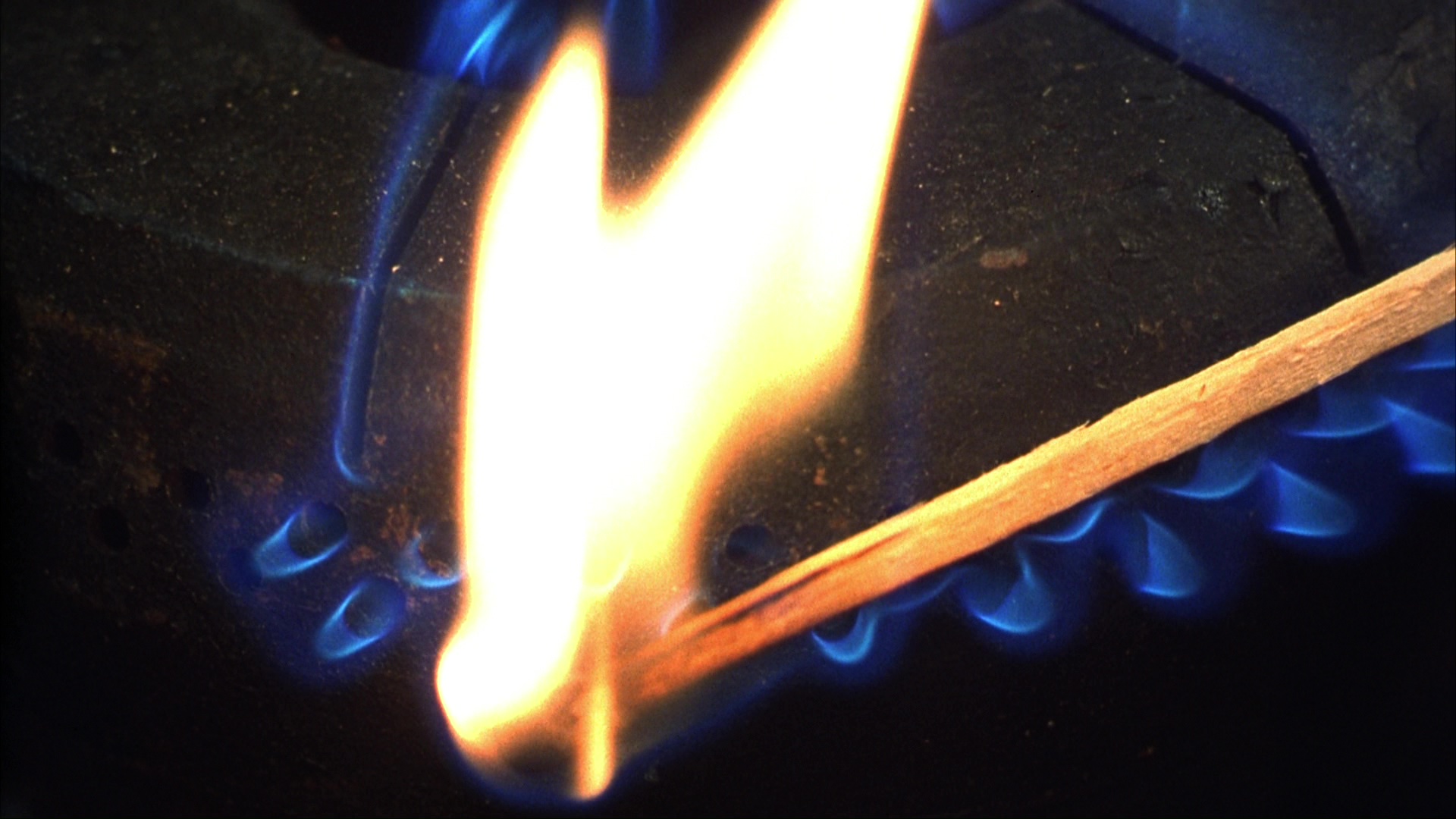 The fire at Ms. Lewton's house and the investigation. Film frame 00981.