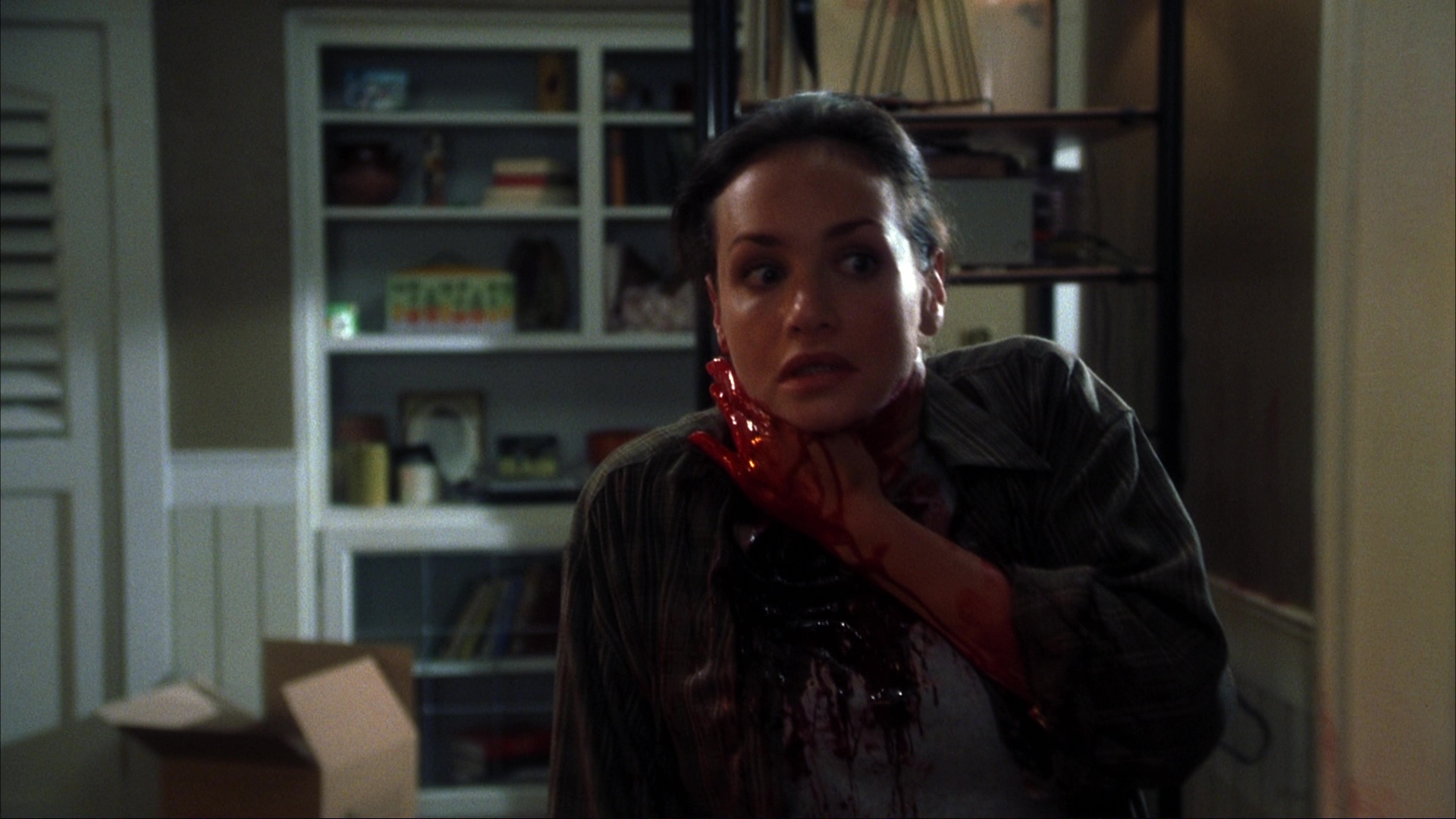 The fire at Ms. Lewton's house and the investigation. Film frame 01064.