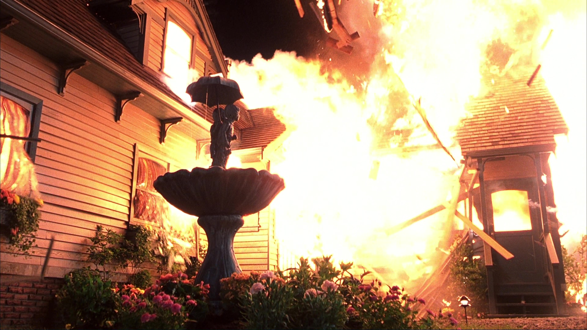The fire at Ms. Lewton's house and the investigation. Film frame 01124.