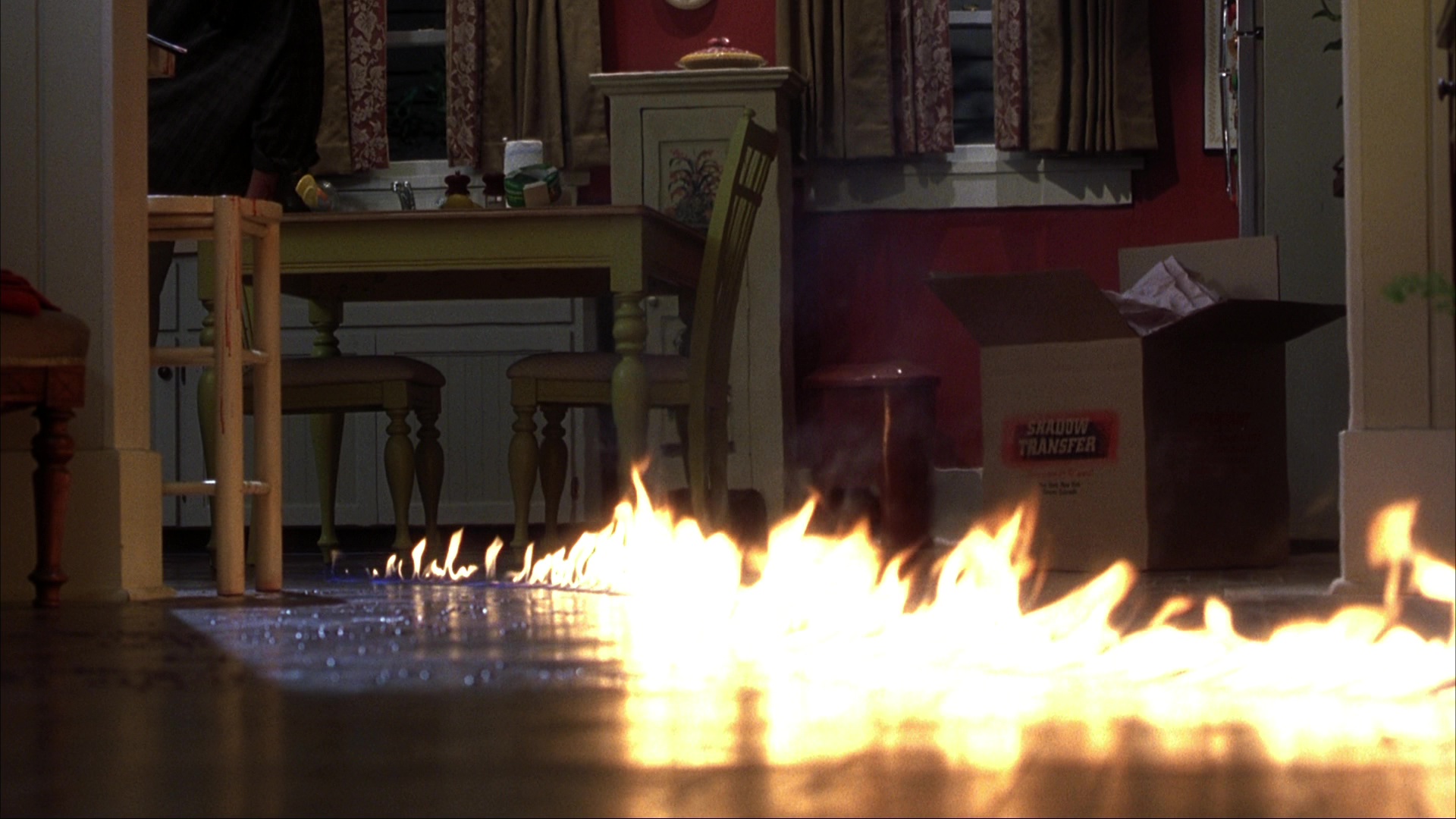 The fire at Ms. Lewton's house and the investigation. Film frame 01074.