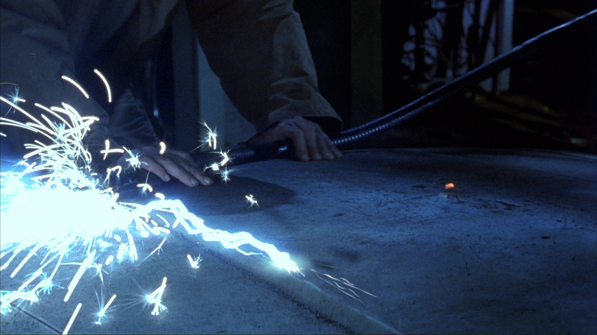 Clear's escape from the garage. Film frame 01427.