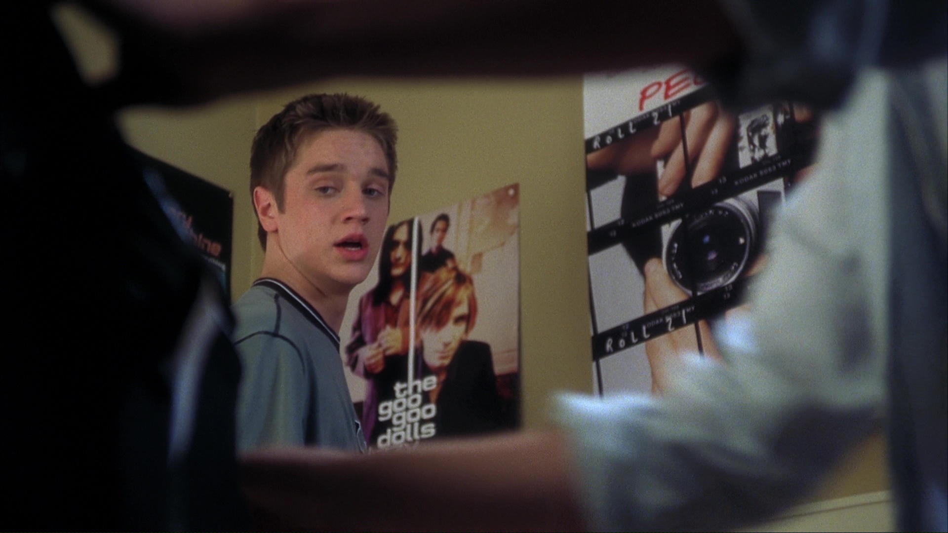 Alex prepares for the class trip. Film frame 00041.