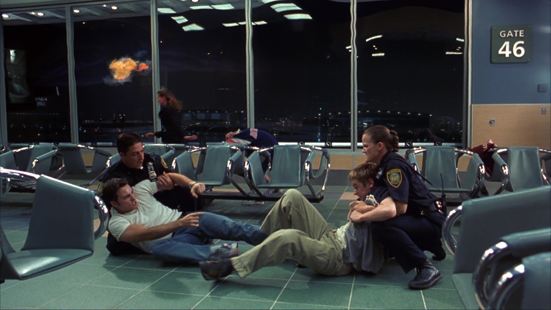 The survivors at the departure gate. Film frame 00415.