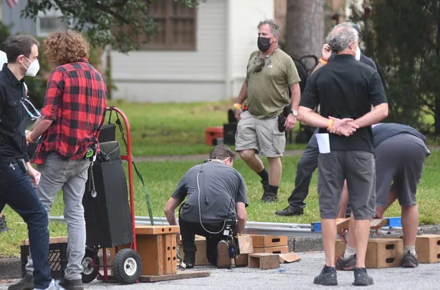 Crew leveling the camera track.