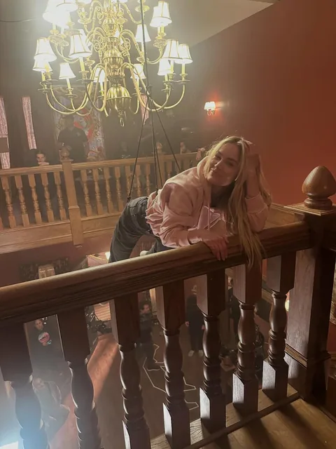 Isabel May on the staircase set.