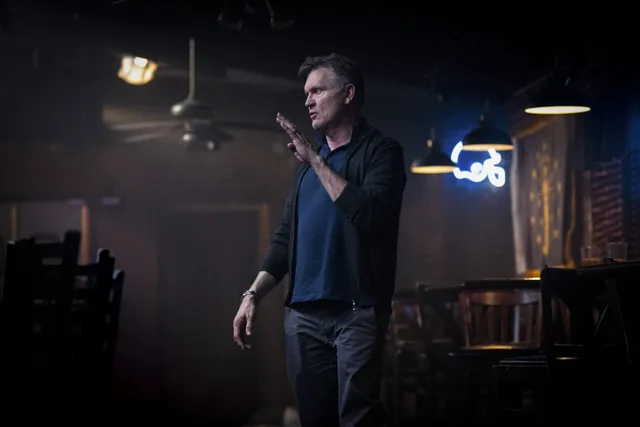Kevin Williamson directing on the bar set.
