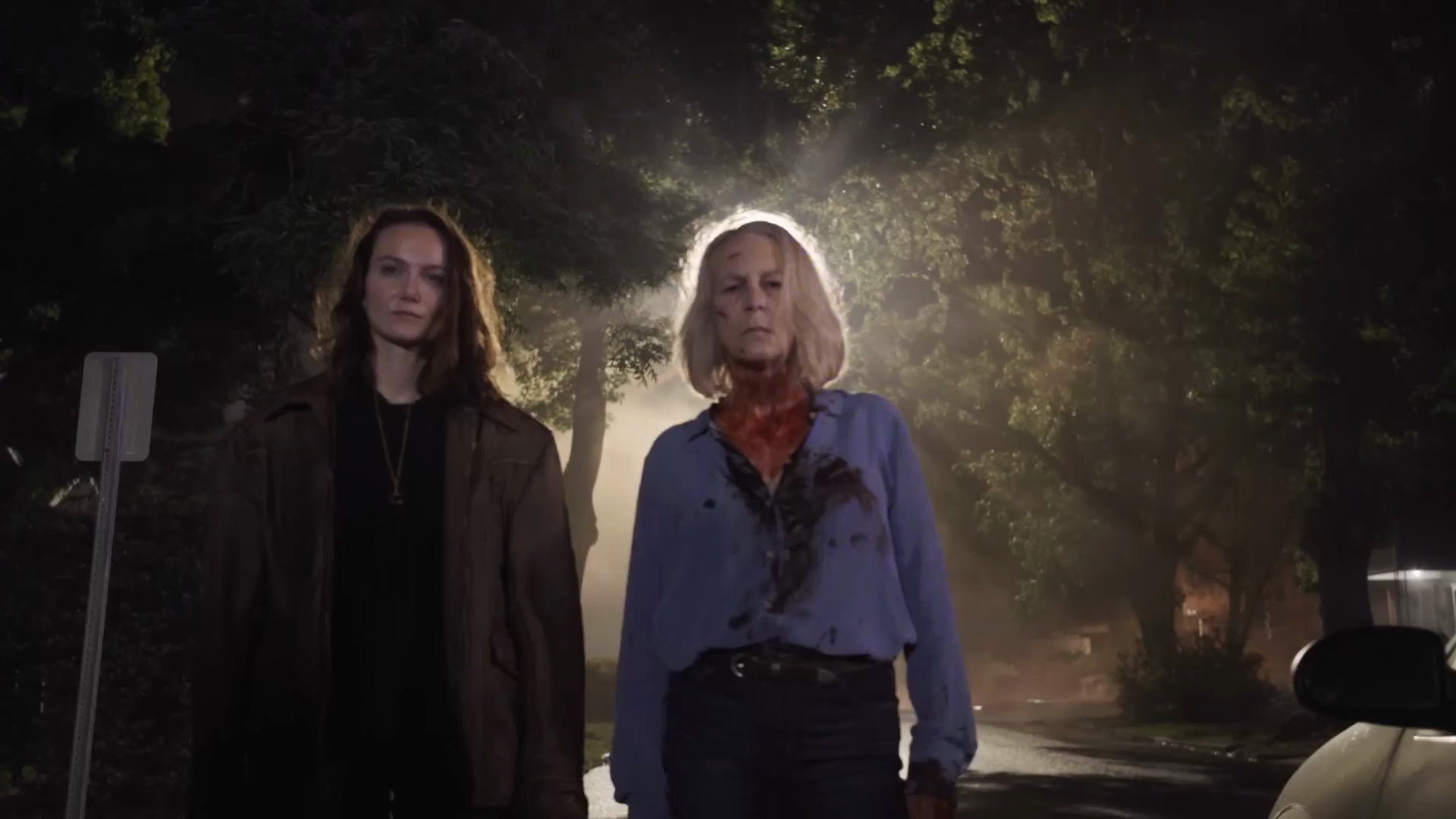 Andi Matichak and Jamie Lee Curtis rehearse on the night exterior set.