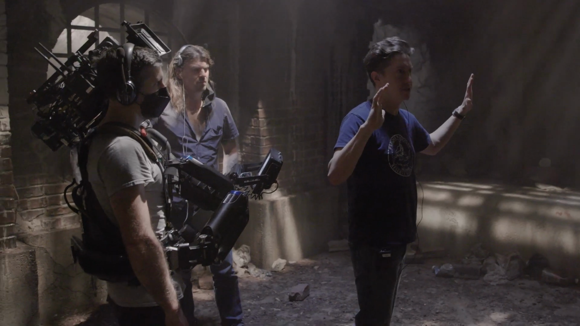 Direction and camera preparation on the sewer set.