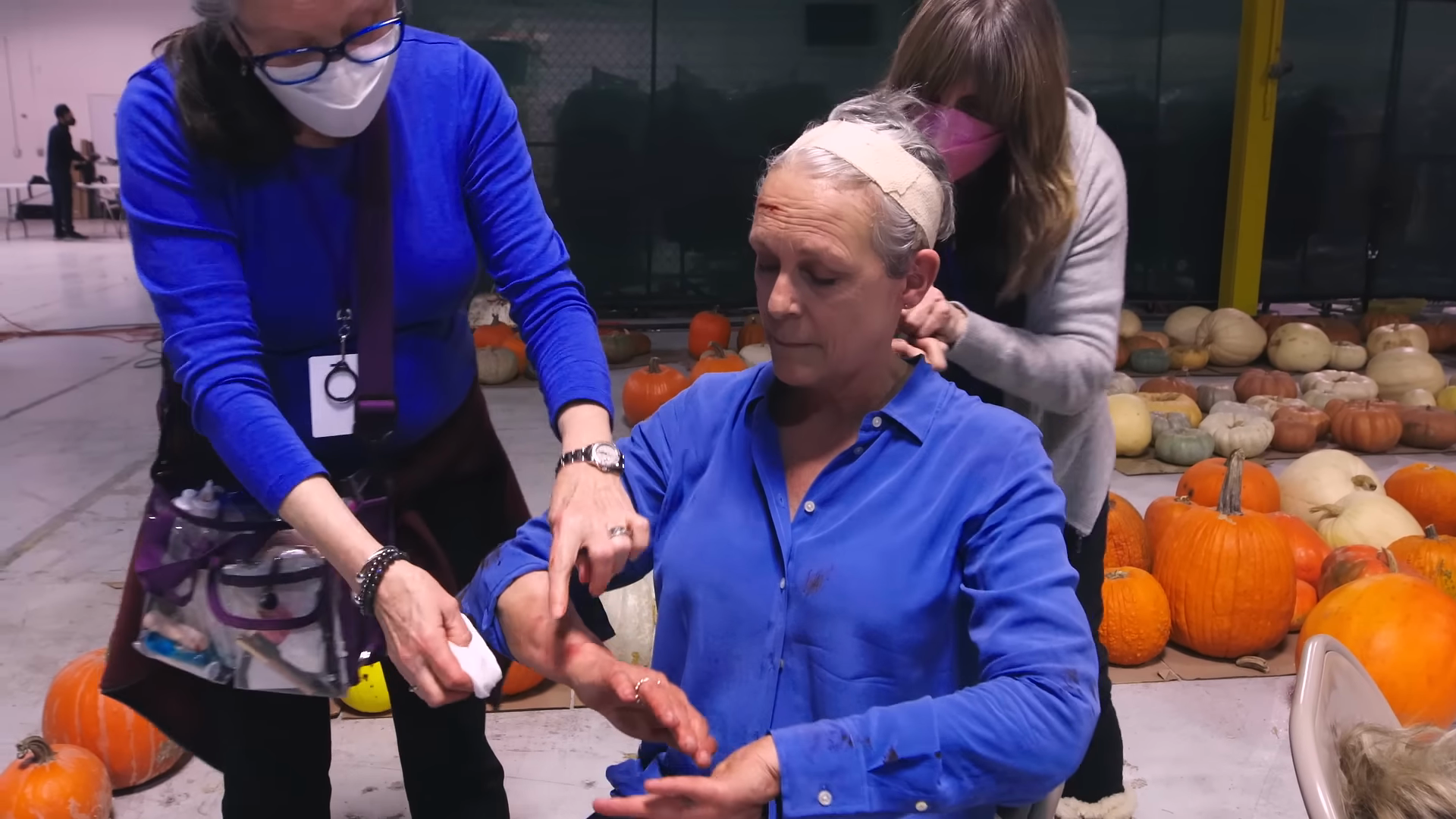 Crew prepare Jamie Lee Curtis’s costume and hair before filming. Frame at 27 seconds from Universal’s official Halloween Ends — Jamie’s Journey featurette.
