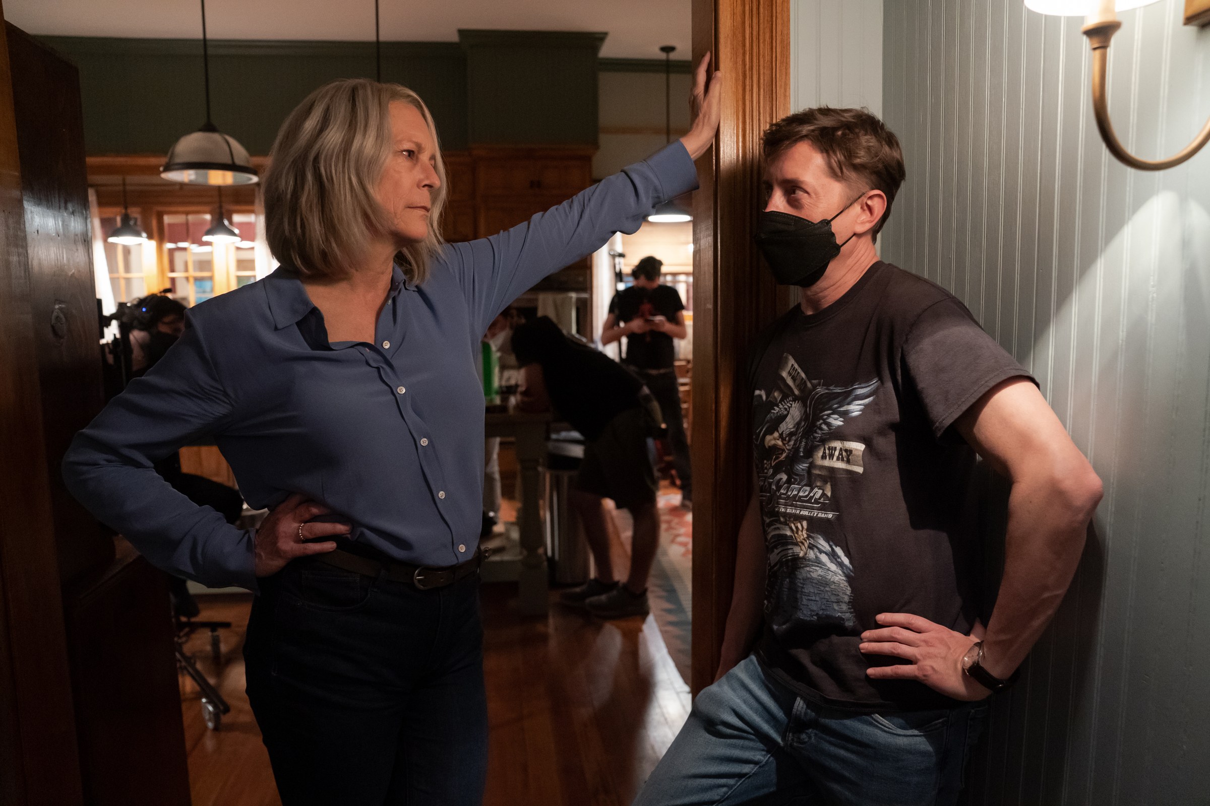 Jamie Lee Curtis and David Gordon Green confer on the kitchen set.
