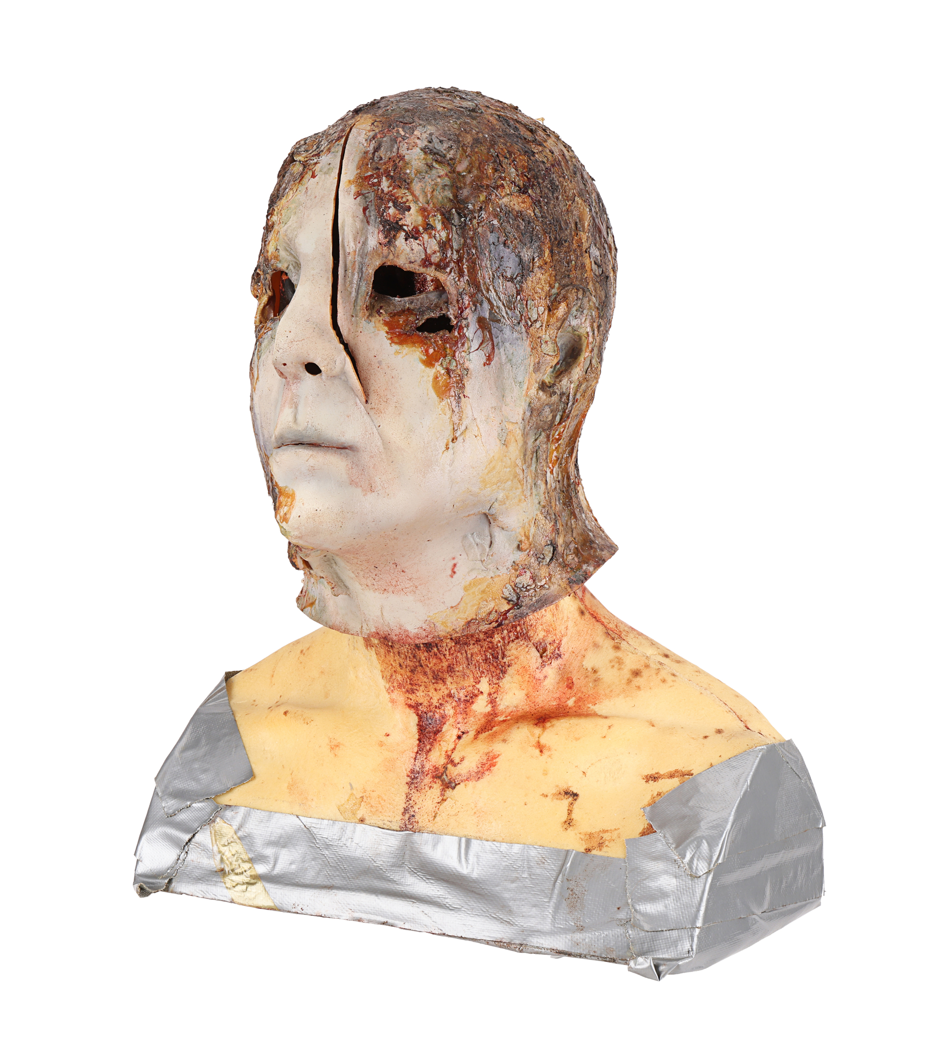 Burnt axe-attack mask created for an alternate ending, three-quarter view. Later catalog photograph by Propstore.