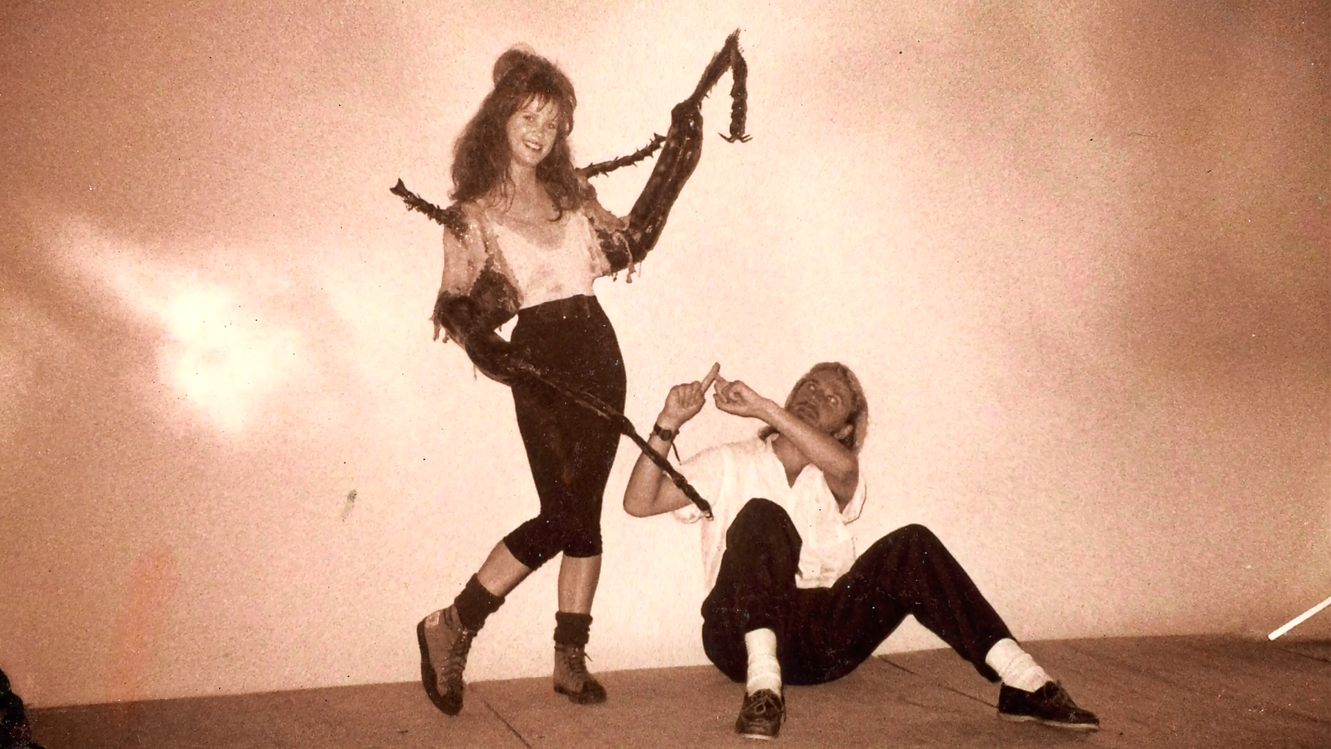 A second movement pose during the cockroach-arm appliance demonstration.