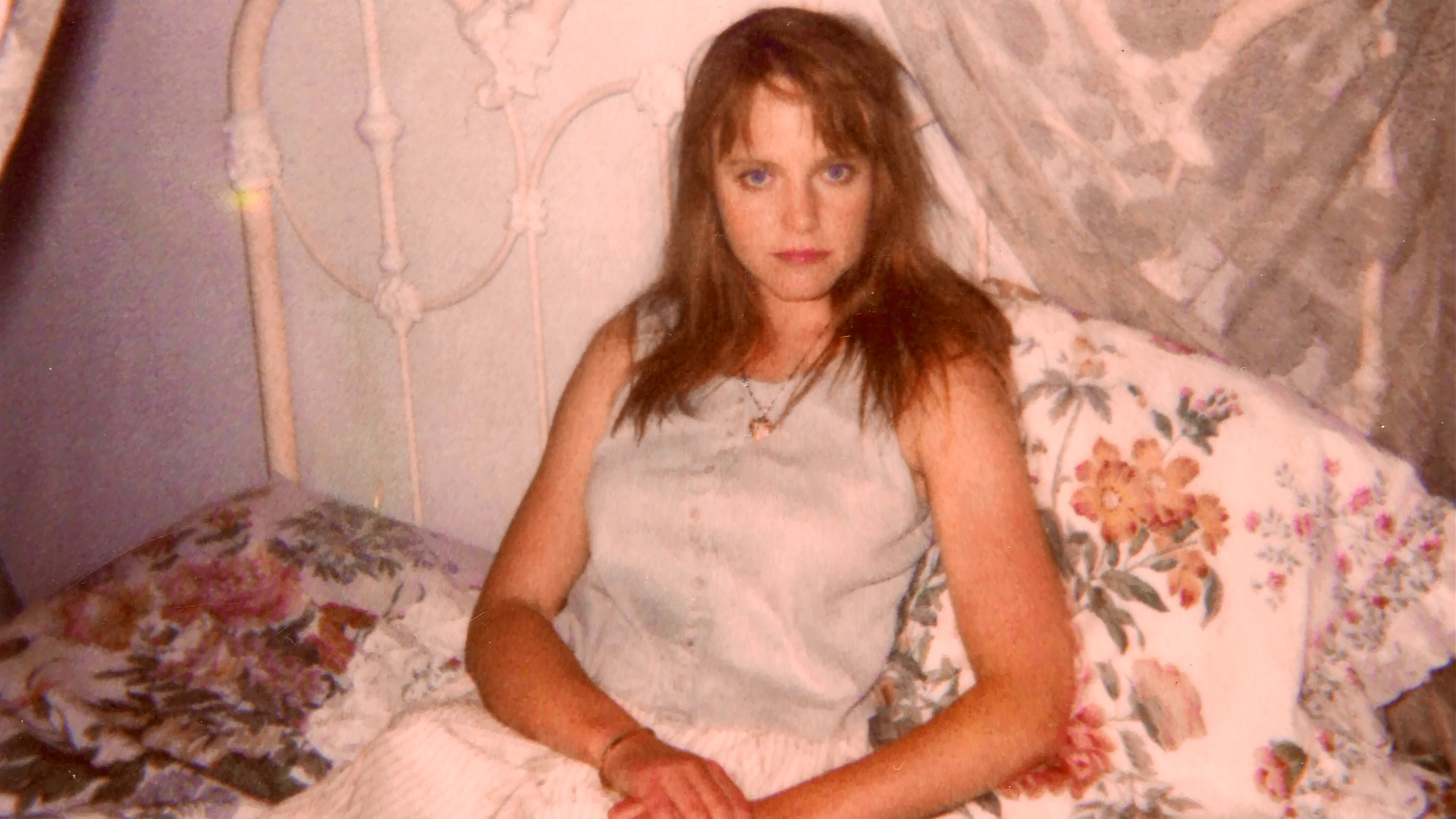 Lisa Wilcox posed on the bedroom set.