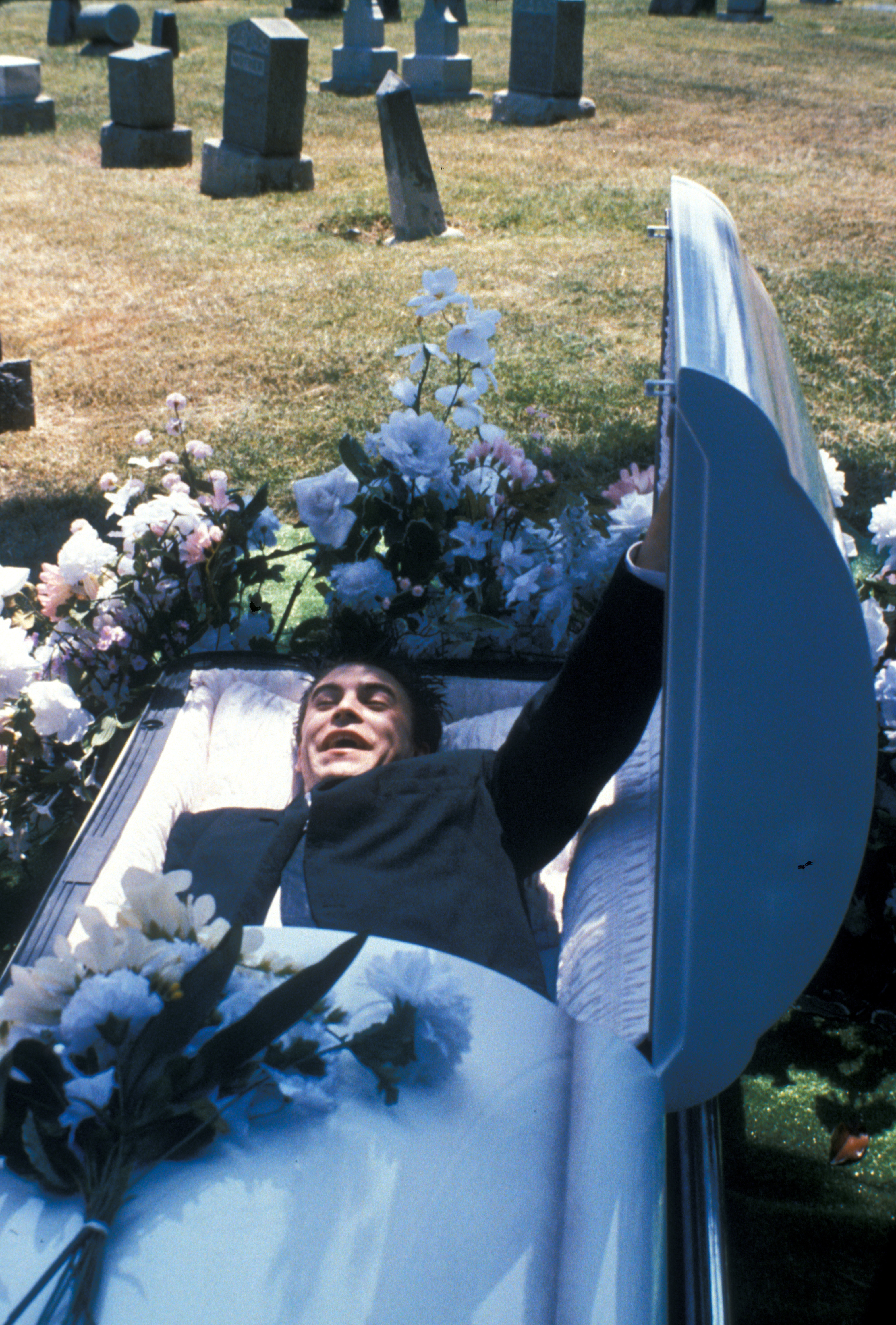 Freddy emerges from a grave.