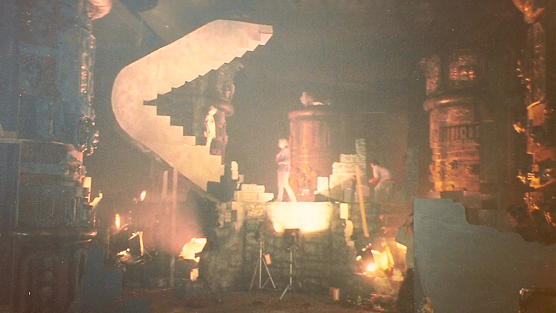 Wide view of the winding staircase and surrounding dream-set construction.