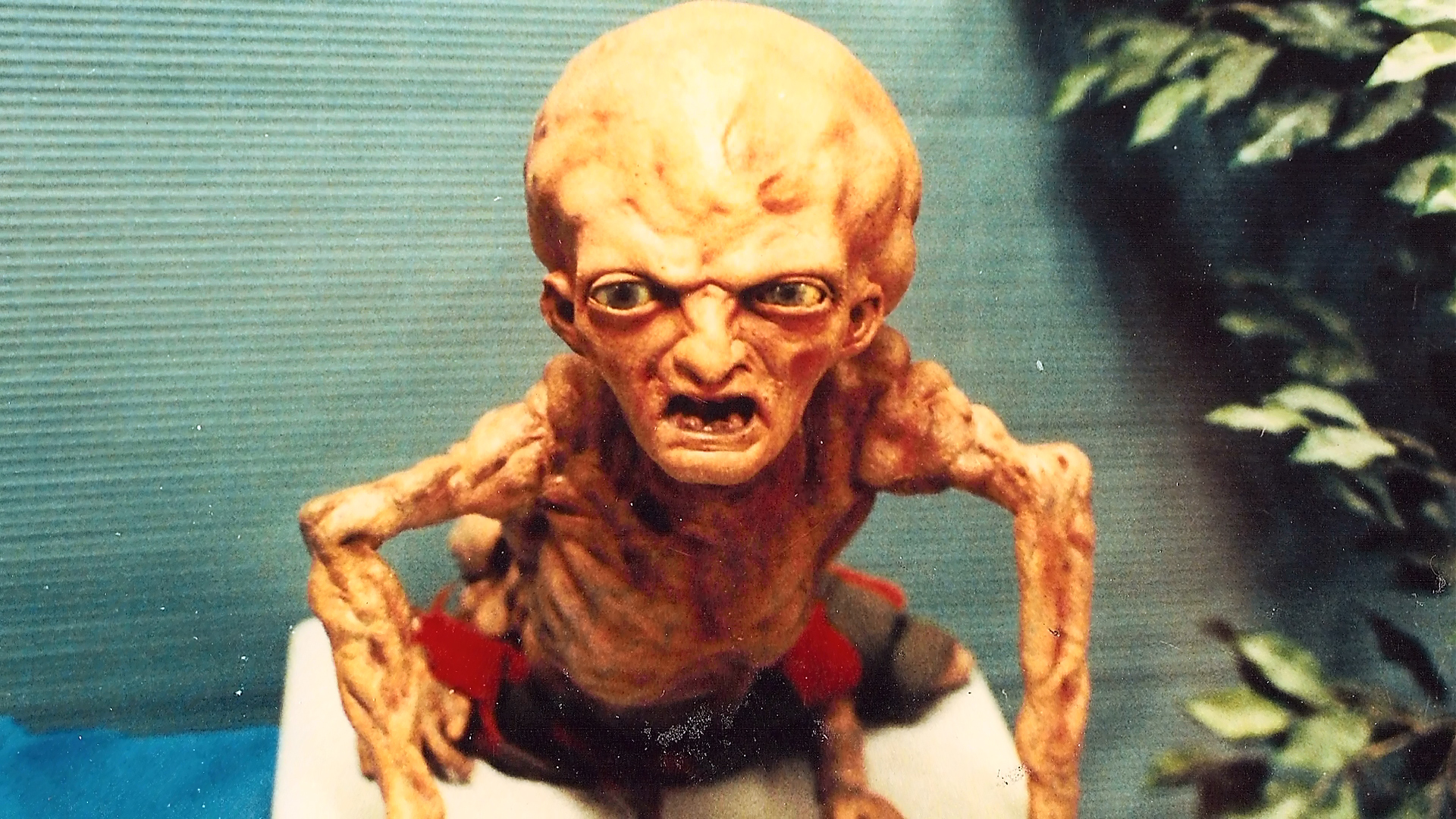 Front view of Baby Freddy standing on a workshop support.