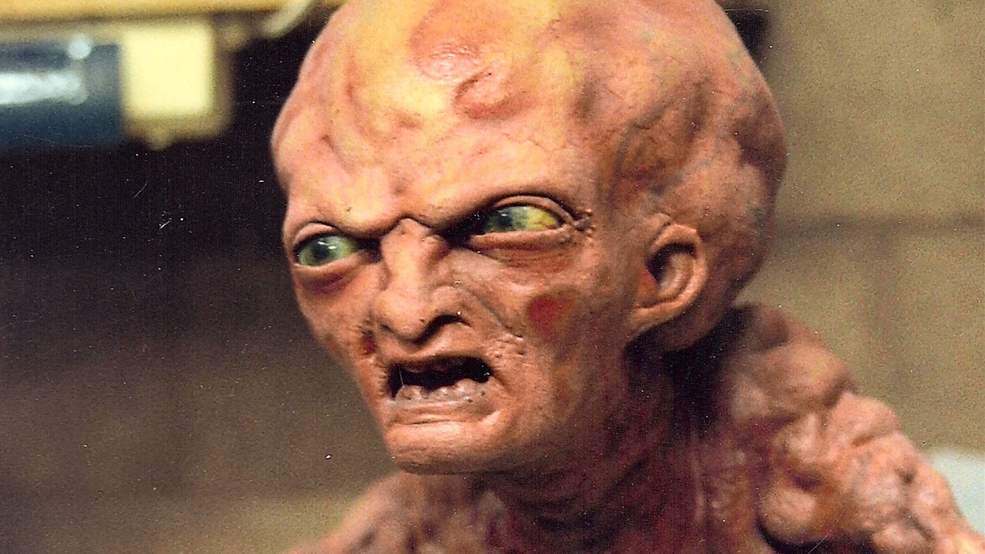Three-quarter reference view of Baby Freddy's face.