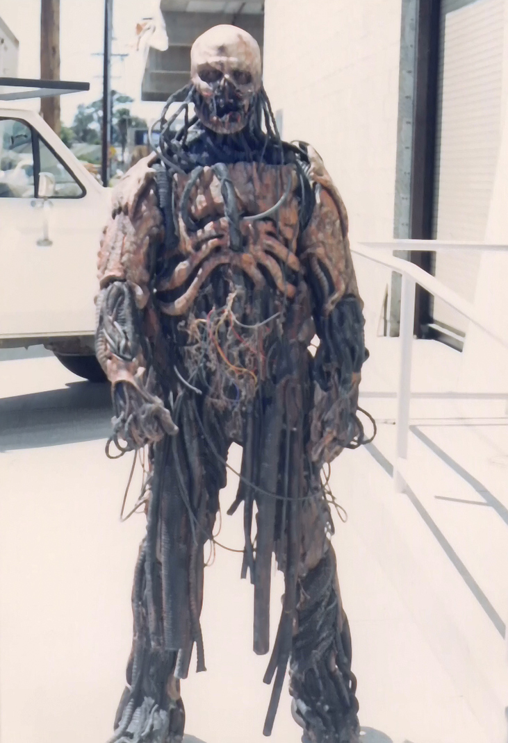 Full-length reference photograph of the biomechanical rider costume; the photograph's date is not established.