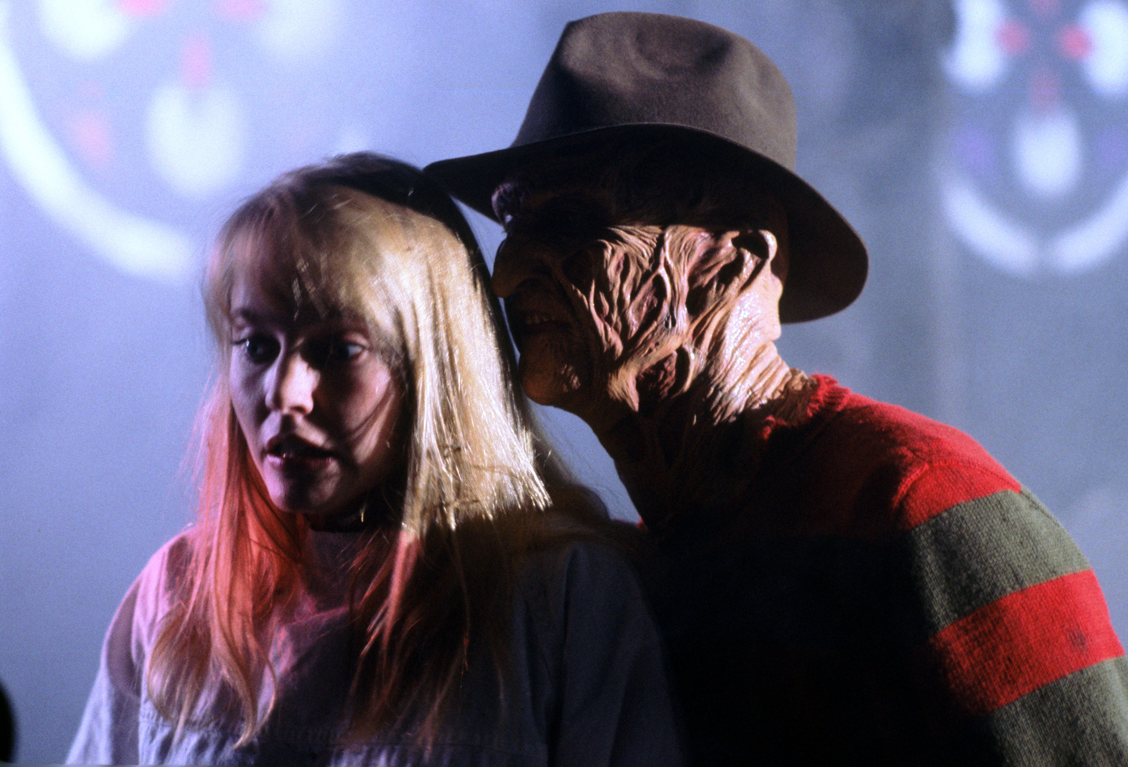 Alice with Freddy behind her.