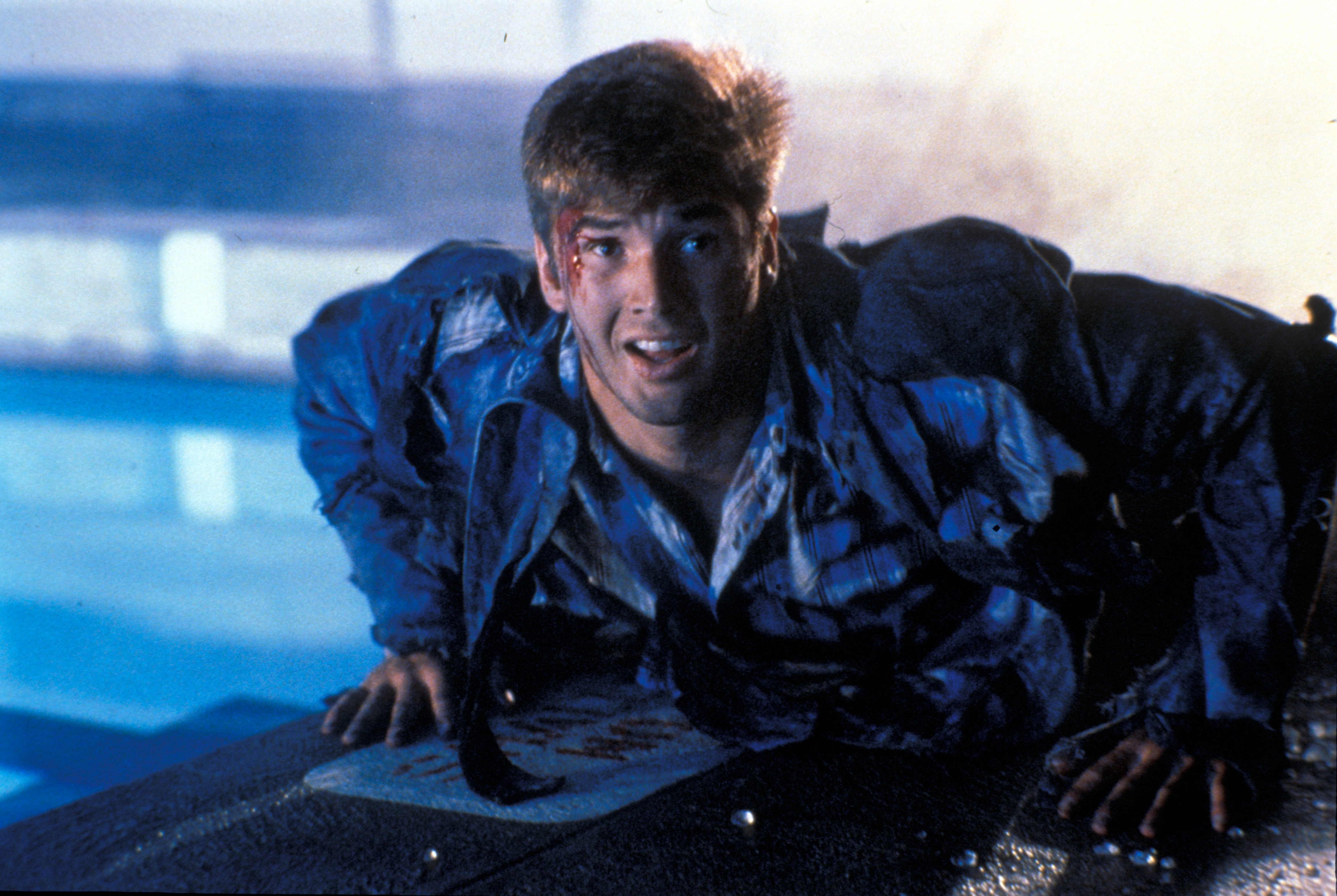 Mark in the blue-lit nightmare.