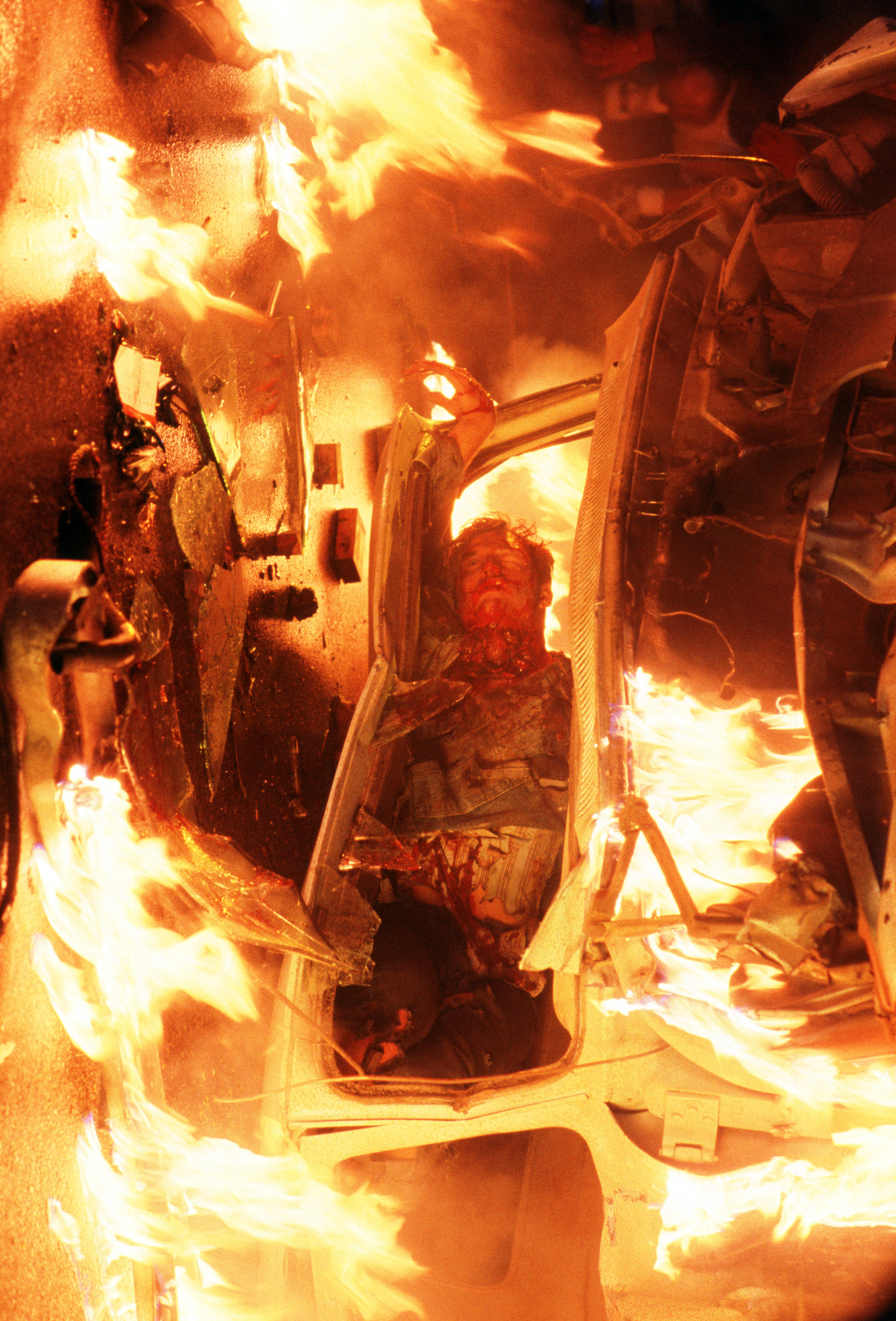 The burning vehicle in the nightmare.