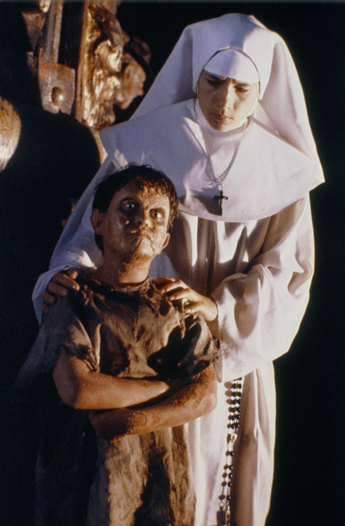 Amanda Krueger standing behind Jacob in the dream climax.