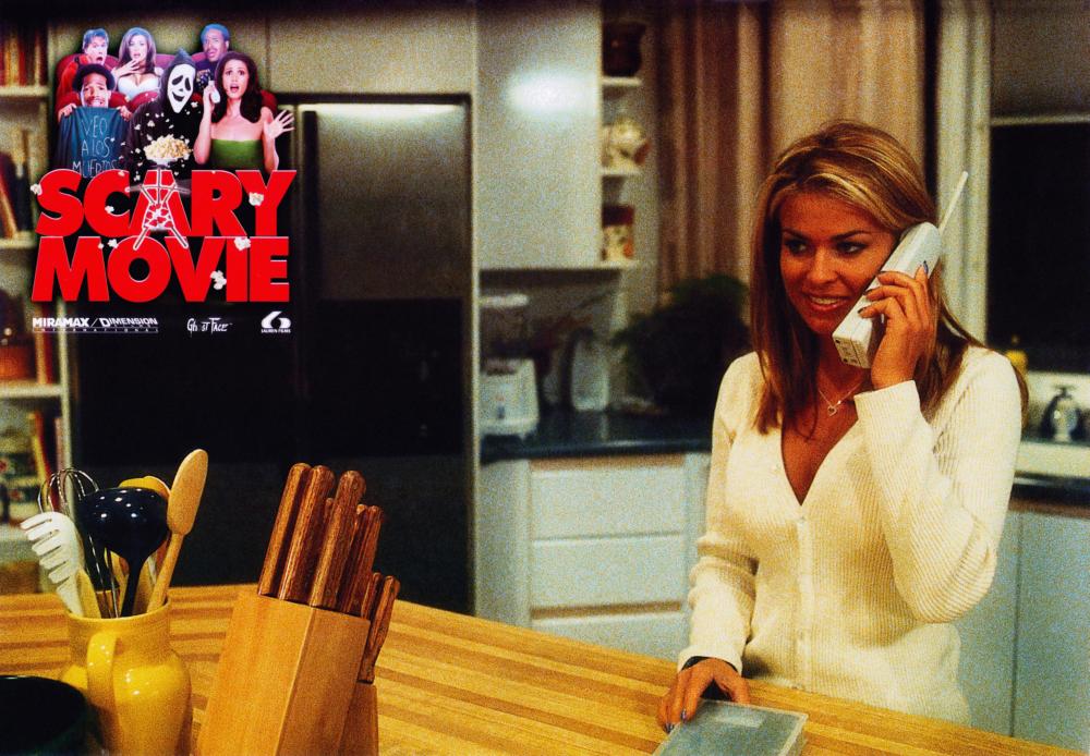 Drew answers the kitchen phone.