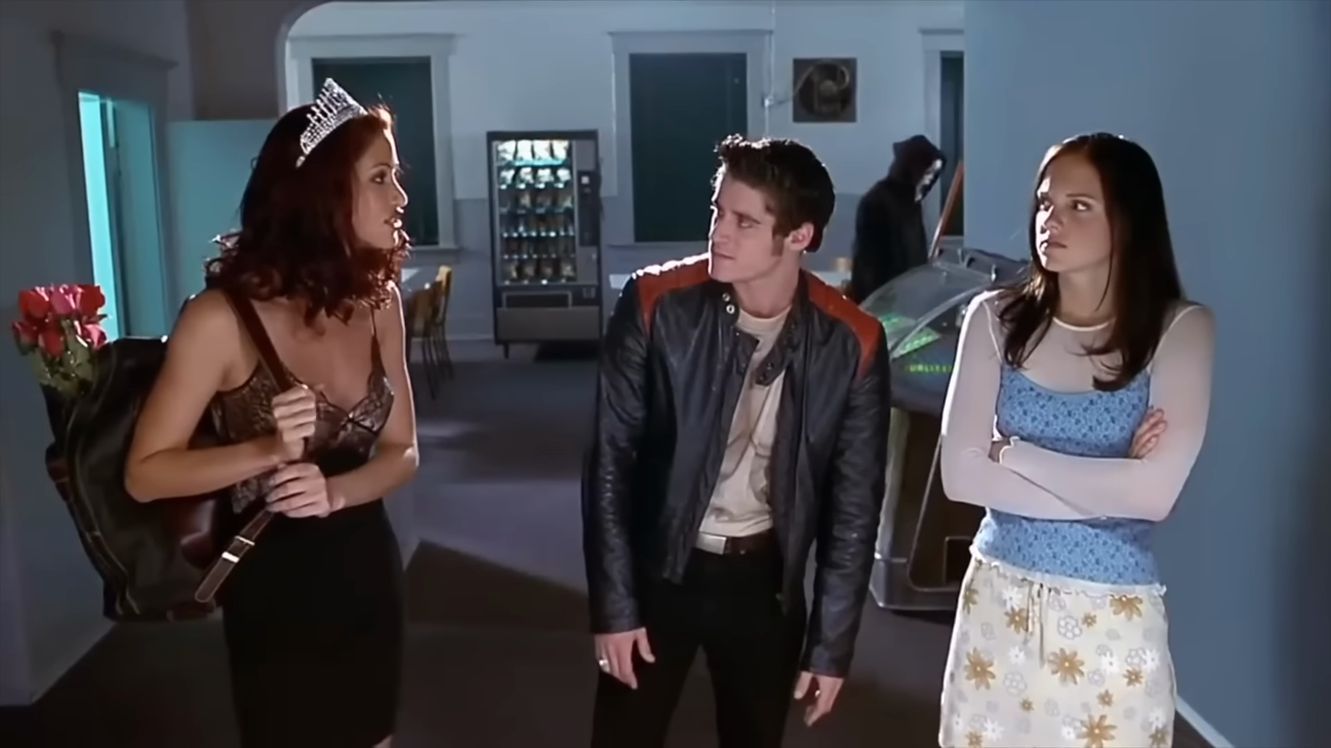 The beauty pageant. Clip frame 03:12.