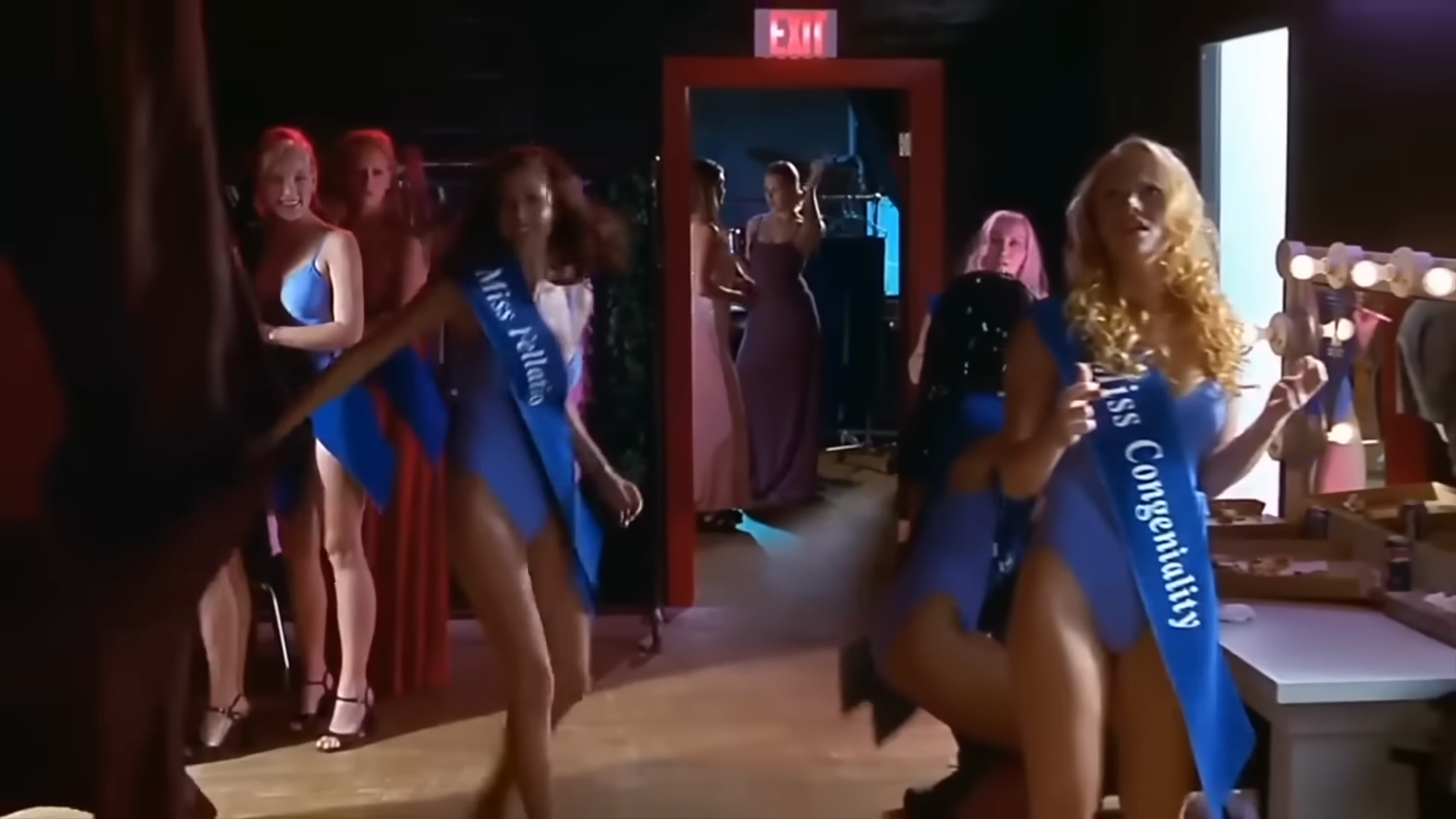 The beauty pageant. Clip frame 02:16.