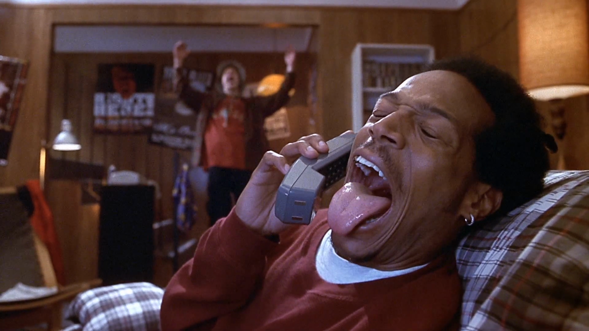 The masked killer joins the phone call. Clip frame 00:24.