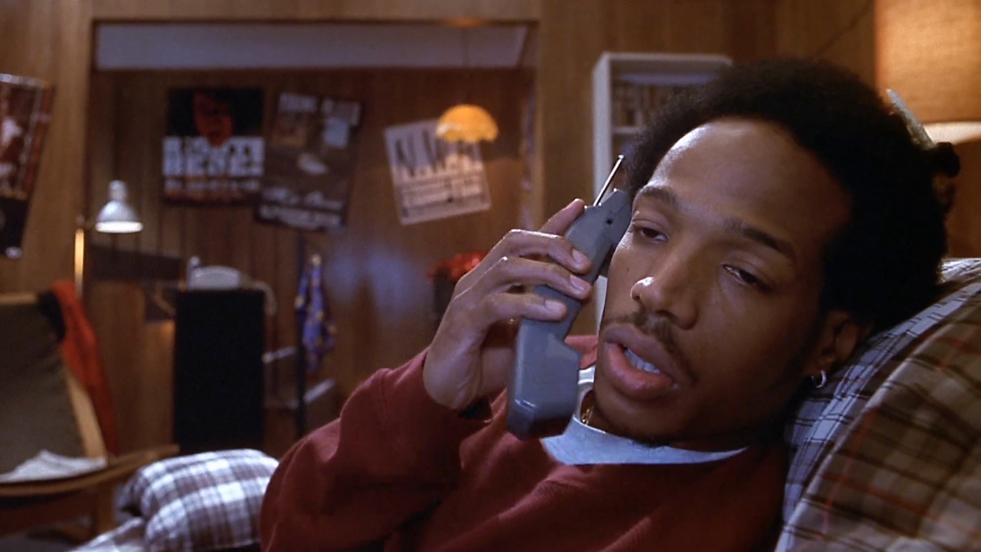 The masked killer joins the phone call. Clip frame 00:08.