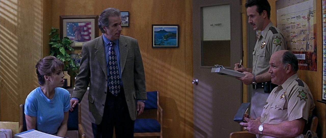 Sidney with Principal Himbry and the police. Film frame.
