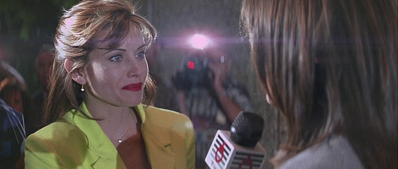 Gale interviewing Sidney. Film frame.