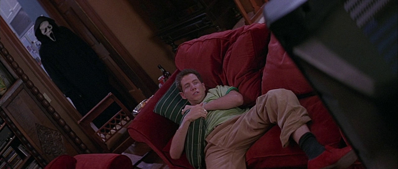 Ghostface approaching Randy. Film frame.