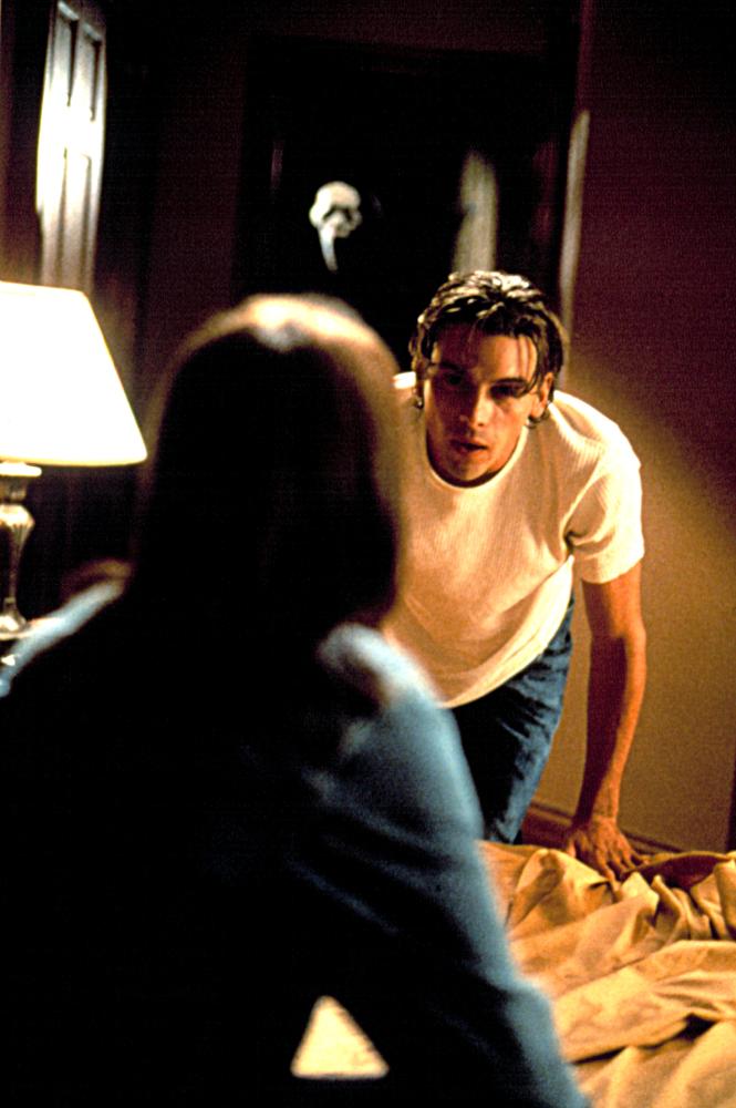 Billy confronts Sidney in the bedroom.