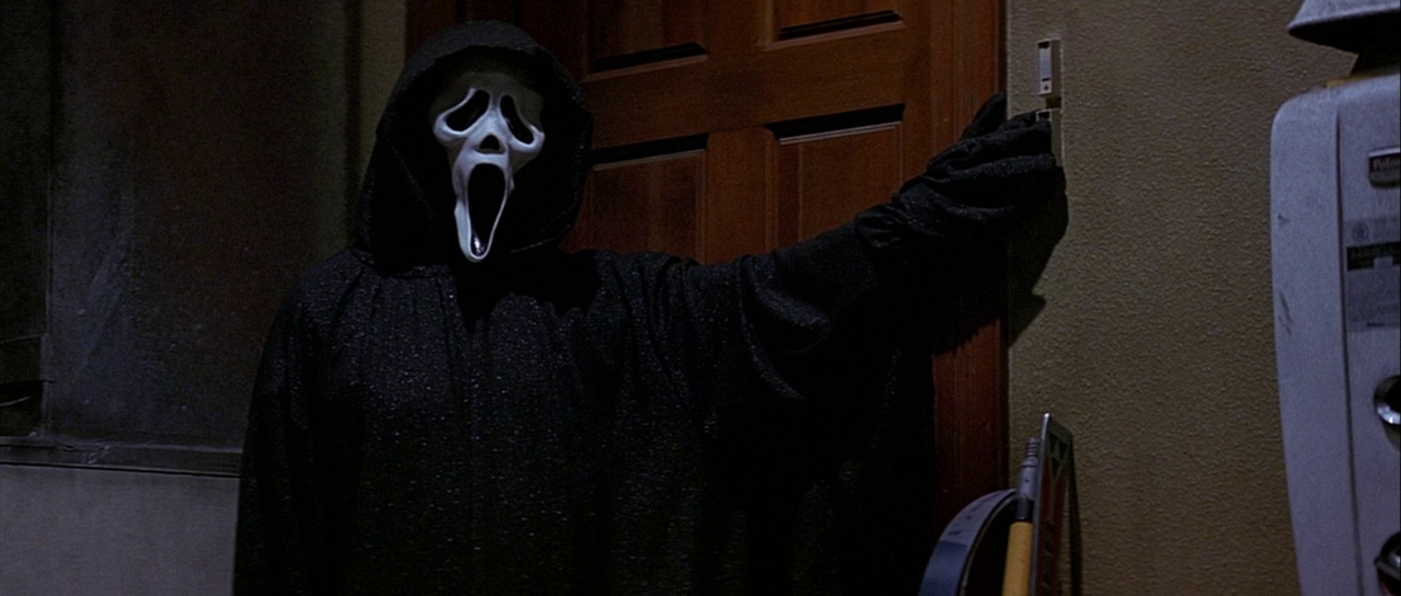 Ghostface in the garage. Film frame.