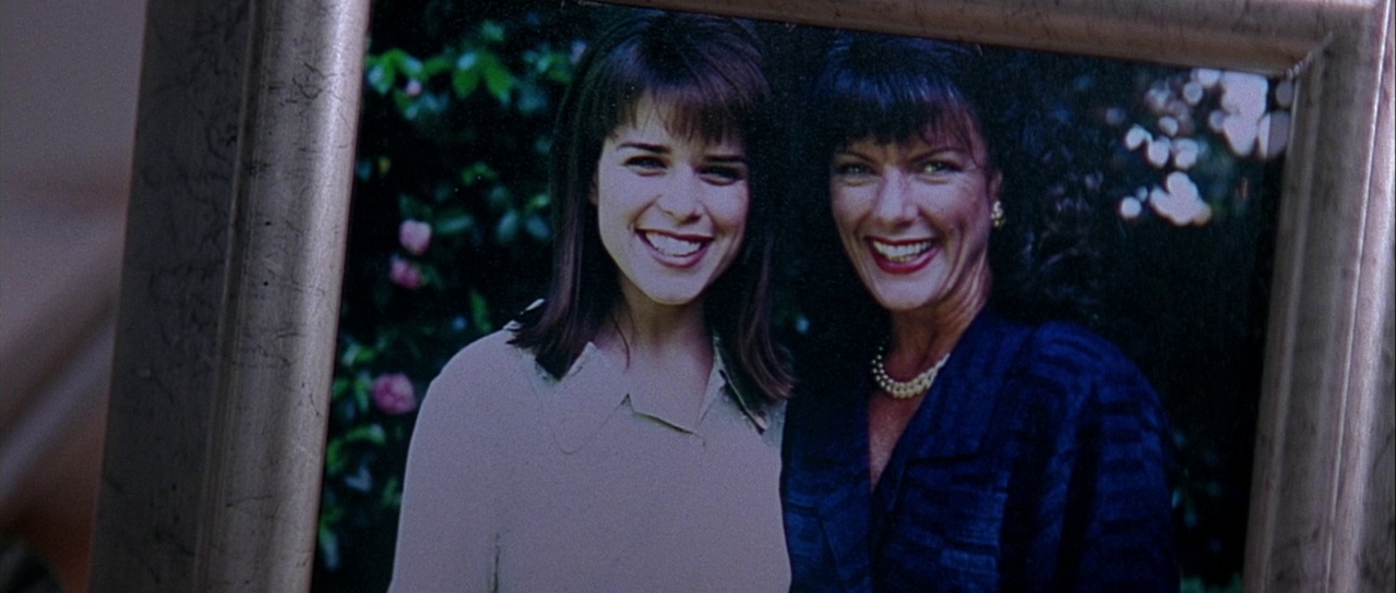 A framed photograph of Sidney and Maureen. Film frame.