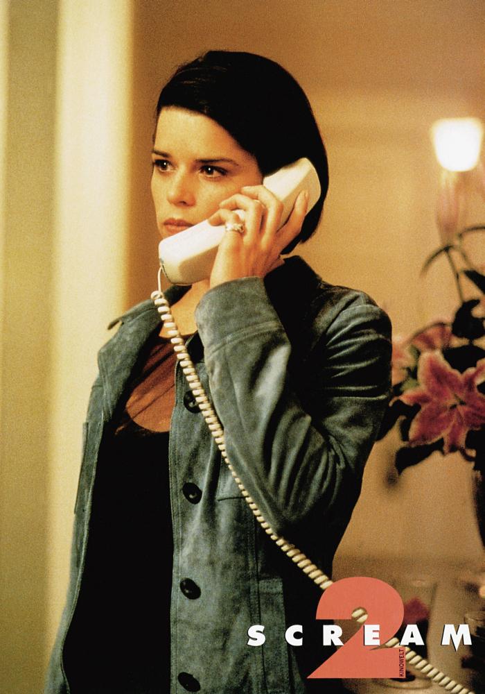 Sidney on the telephone publicity card.