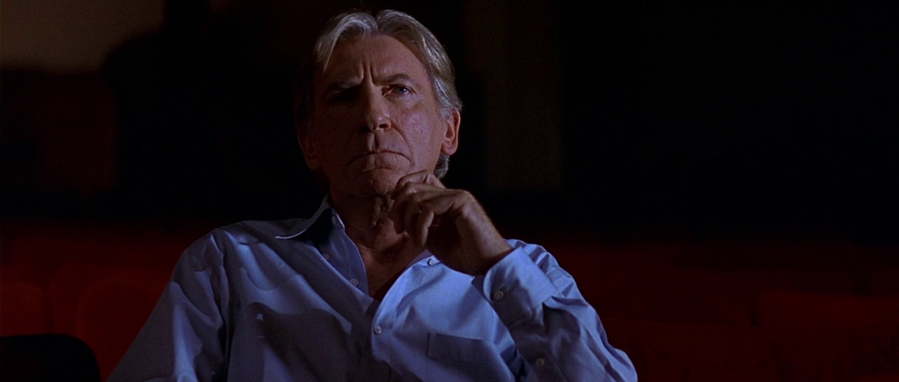 Sidney’s drama teacher watching. Film frame.