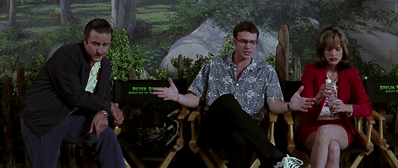 Performers in Stab 3 cast chairs within the film. Film frame.