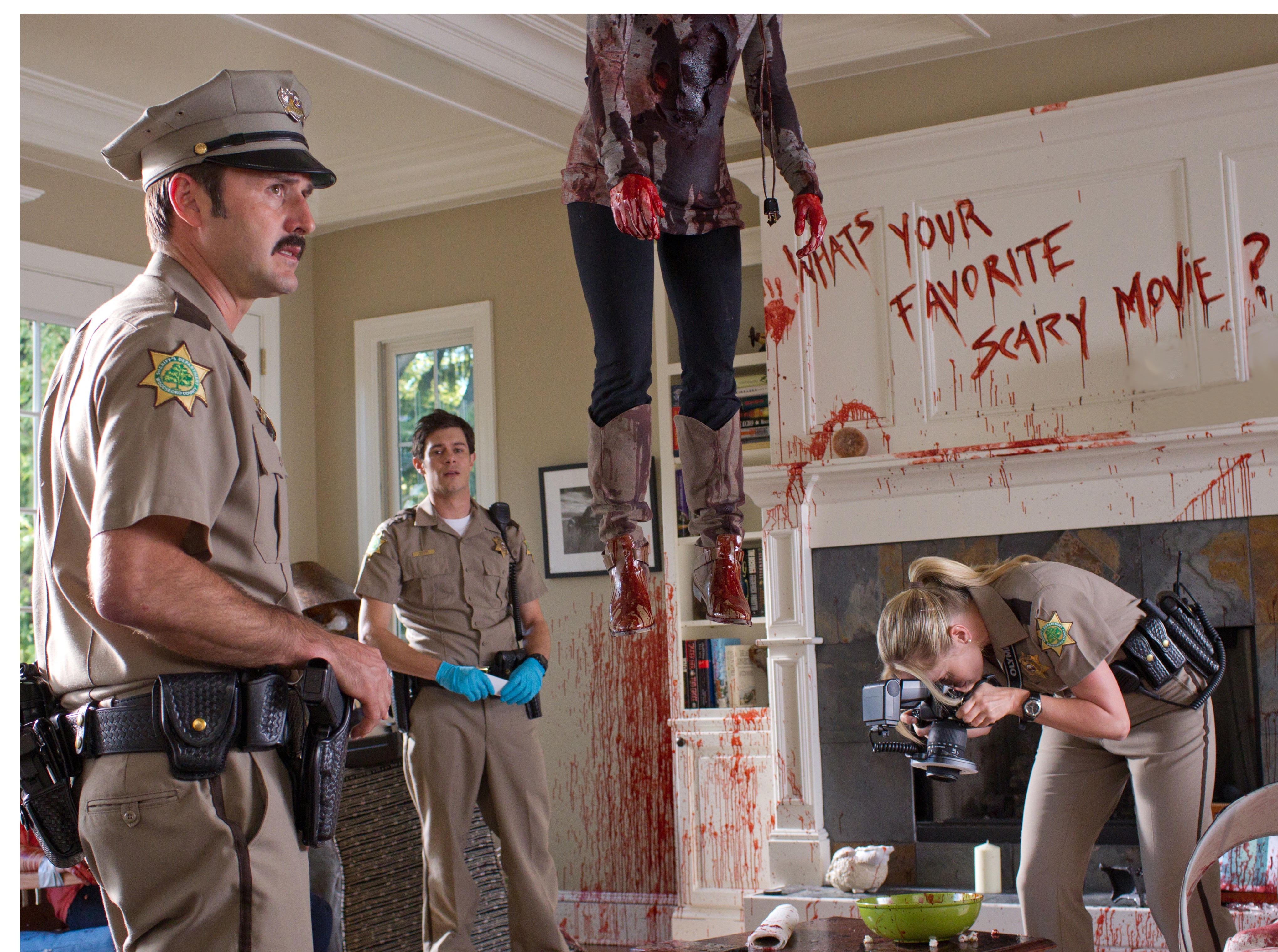 Dewey examines the crime scene.