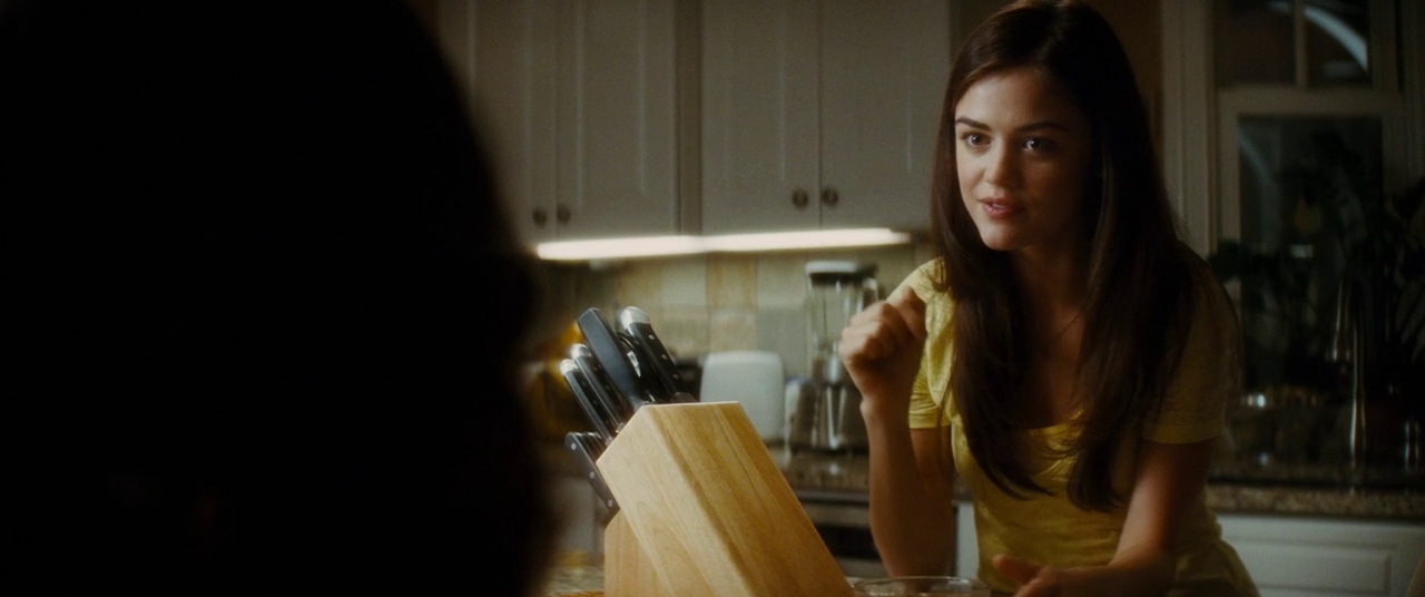 Trudie at the laptop in the Stab 6 opening. Film frame.