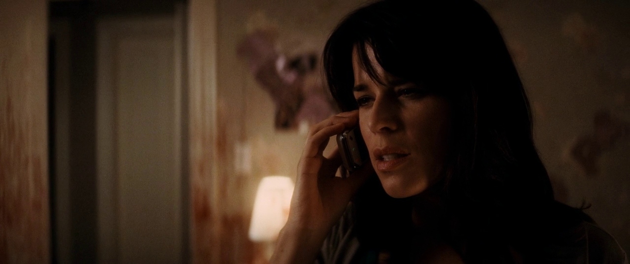 Sidney holding the telephone. Film frame.